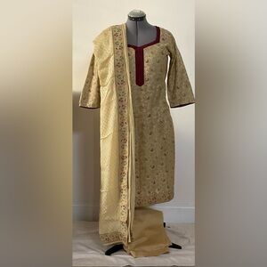 Golden floral design salwar, kameez and beautiful chunni